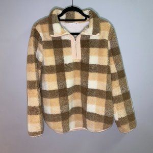Brown and tan plaid pullover. Size medium.